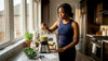 Woman preparing protein smoothie for brain health