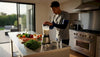 Athlete preparing protein shake in kitchen