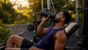 Athlete preparing recovery shake in kitchen