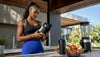 Fit Black woman reading protein label in kitchen