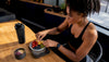 Hands measuring healthy food portion on scale
