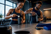 Black athletes preparing training supplements