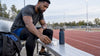 Black athlete preparing supplement before cardio