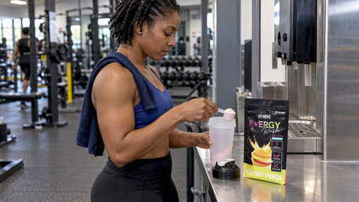 Black lifter measuring pre-workout serving