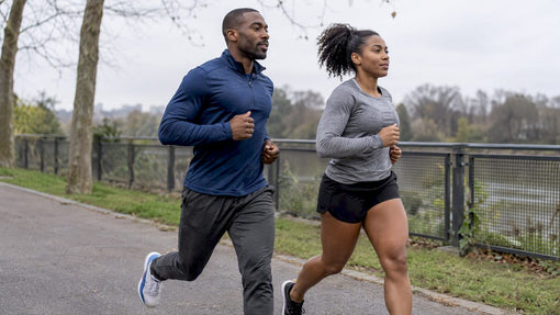 Two Black runners wearing joggers and shorts